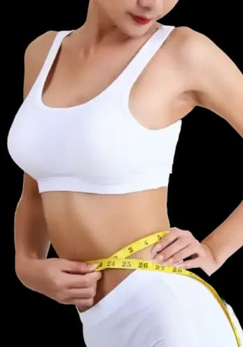 A young woman measuring her waist.